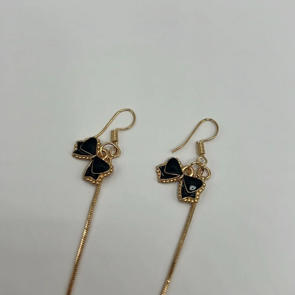 Black Enamel Bow Tassel Earrings